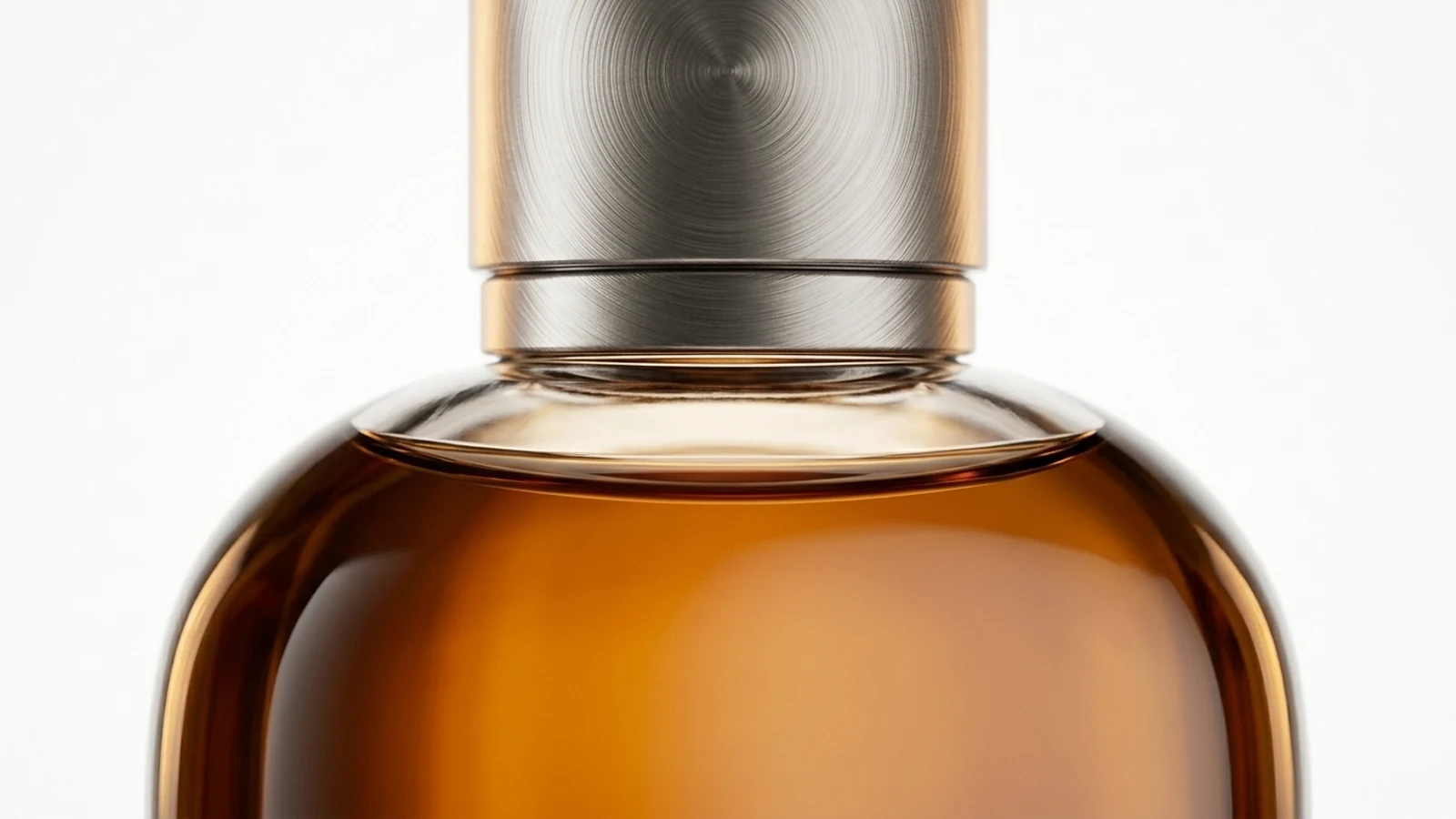 Macro detail of a CGI perfume bottle cap demonstrating the level of finish that drives 3D product visualization cost